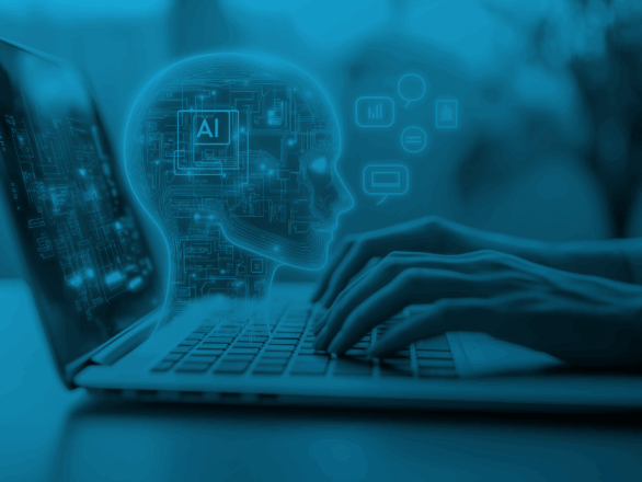 Hands typing on a laptop keyboard with a digital outline of a human head displaying AI icons and circuits emerging from the screen.