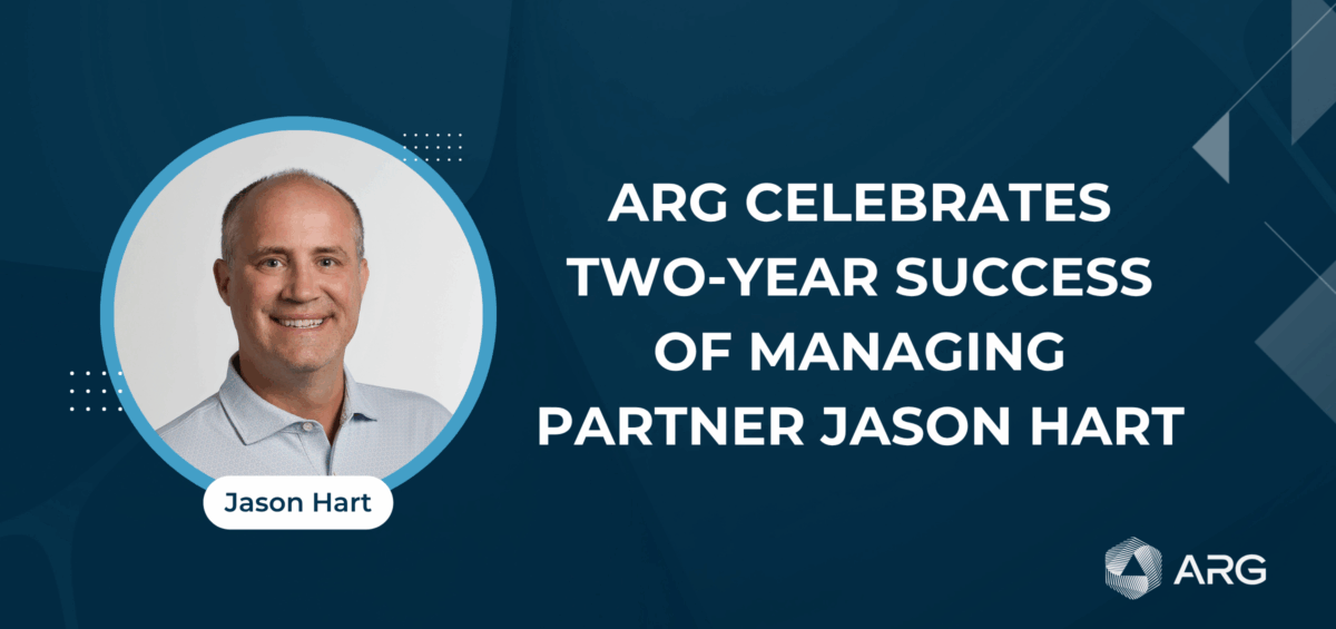 Headshot of Jason Hart with text: "ARG celebrates two-year success of managing partner Jason Hart" on a blue background with ARG logo.